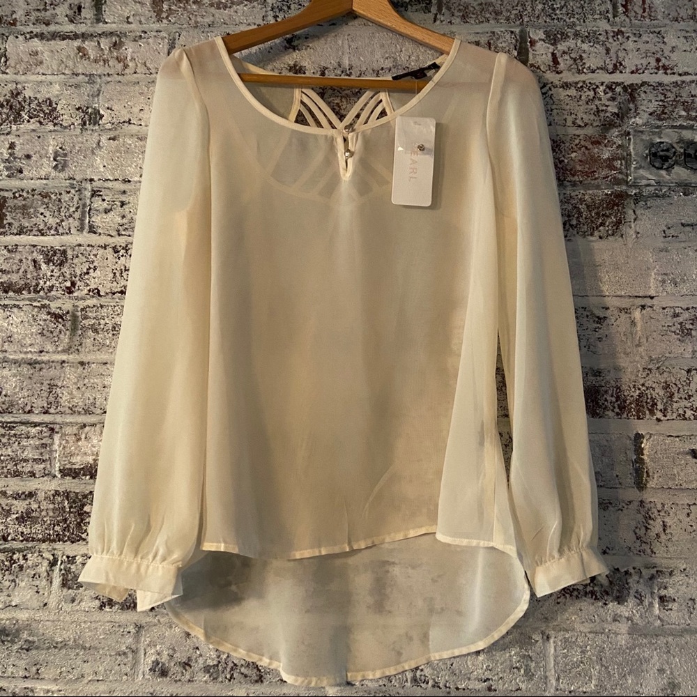 Stunning, cream colored sheer blouse